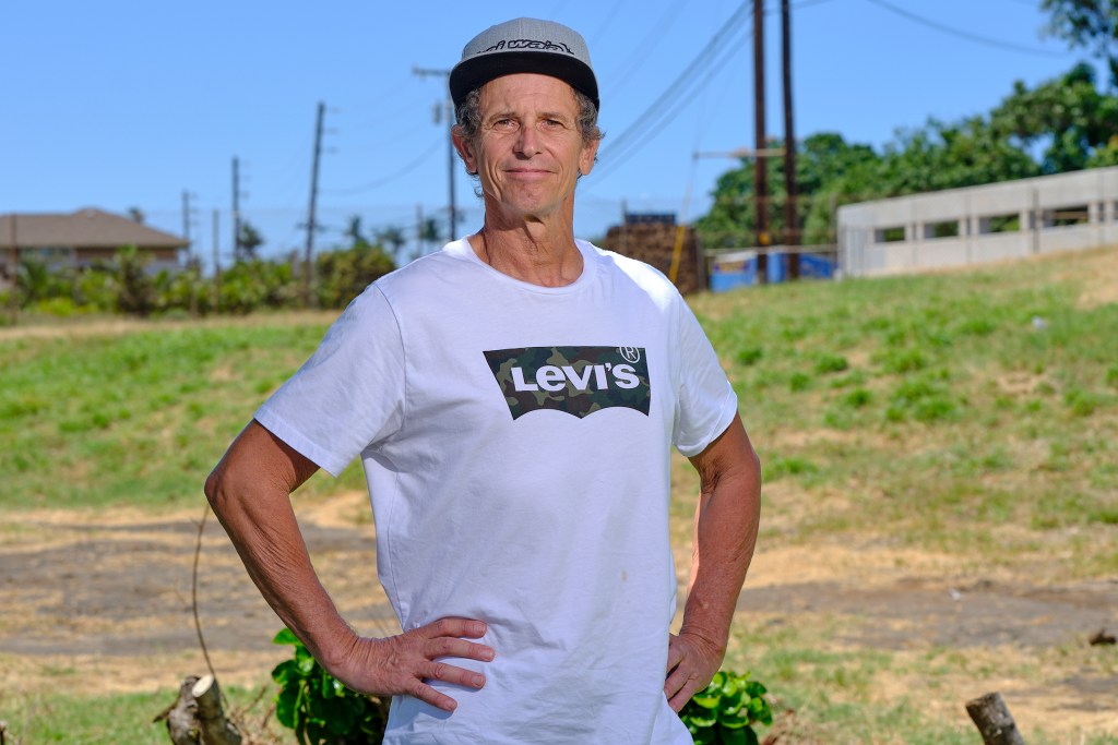Bob Fischer, a victim of the Lahaina wildfire photographed in the area around the Lahaina Safeway in west Maui, Friday April 18th, 2024. He is angered by banks who have taken insurance payouts to fire victims and are holding them in escrow and paying minuscule amounts of interest while they are making large amounts of interest on the same money (David Croxford/Civil Beat/2024)