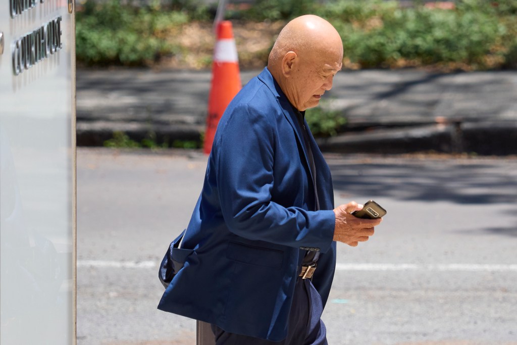 Rudy Alivado, one of the witnesses in the Kaneshiro bribery case, leaves the Prince Jonah Kalanianaole Federal Building for a lunch adjournment April 24, 2024. (David Croxford/Civil Beat/2024)