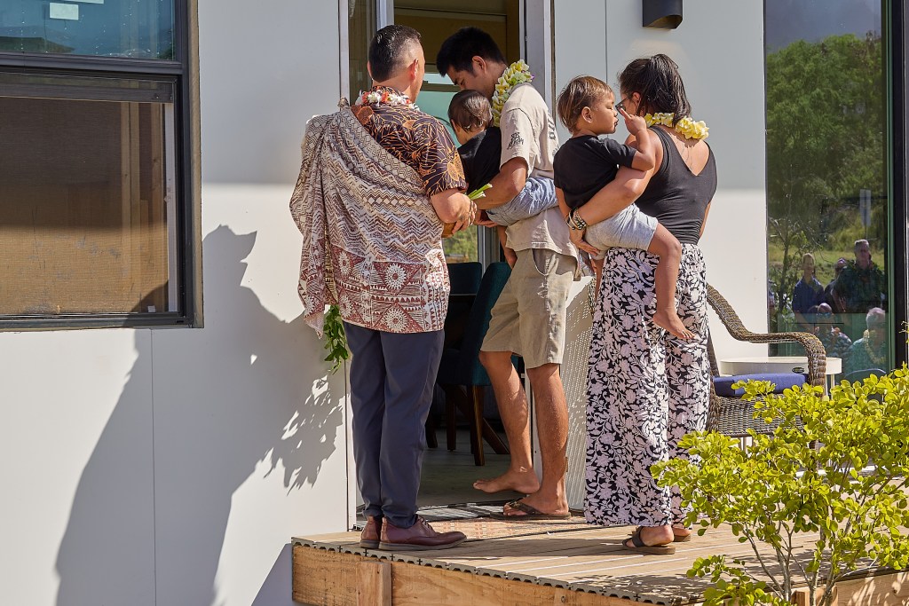 The Ke Ao Maluhia at Maui Lani  has already begun to house Lahaina Fire victims. The first unit was presented to the Frasier (Sp?) family  taking possession during an afternoon ceremony that included Maui Mayor Richard Bissen, Governor Josh Green.  Other dignitaries representing individual groups that have supported the efforts since the days shortly after the August 8, 2023 fire were also in attendance Da.vid Croxford/Civil Beat/2024