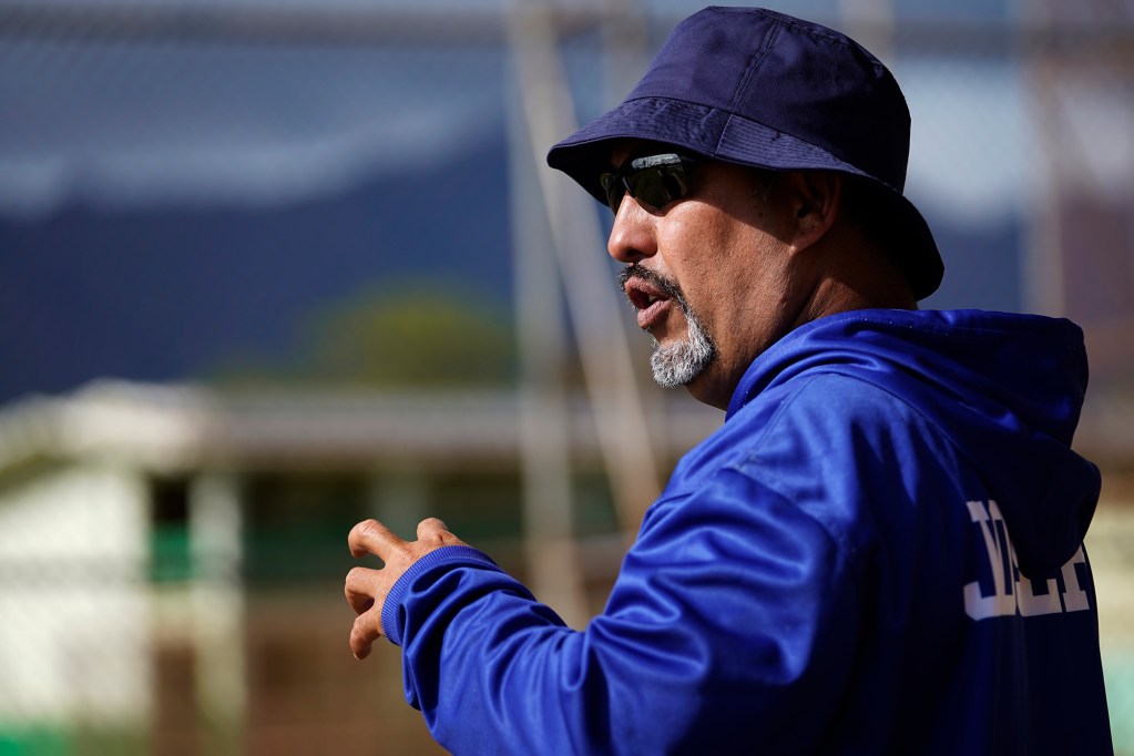 Coach Kenny Johnson talks about reserving practice time at Maili Community Park Thursday, May 2, 2024, in Waianae. (Kevin Fujii/Civil Beat/2024)
