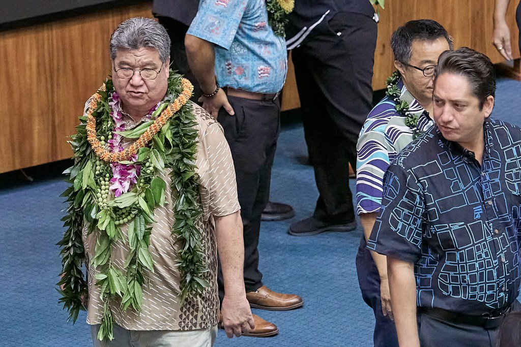 At the conclusion of the legislative session of the Senate, President Ronald D. Kouchi made his rounds while other Senators were greeting each other. (David Croxford/Civil Beat/2024)