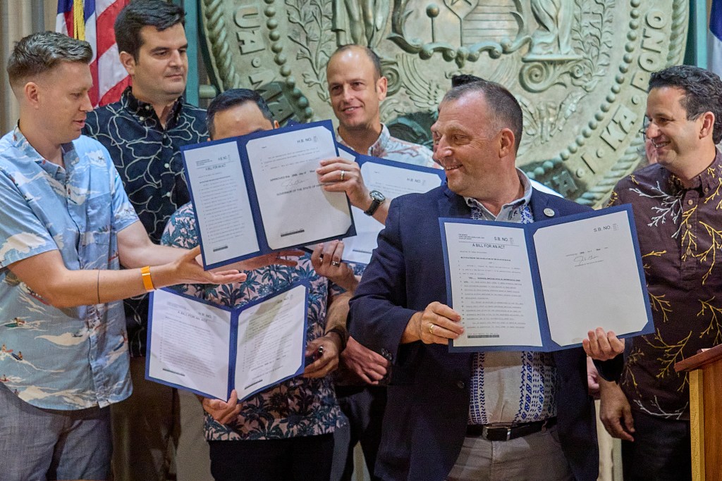 Hawaii Governor Josh Green M.D. signed several Bills into law pertaining to the housing shortage in Hawaii. Several members of his cabinet along with Senator Brian Schatz shared in the moment, Photographed May 28, 2024 (David Croxford/Civil Beat/2024)