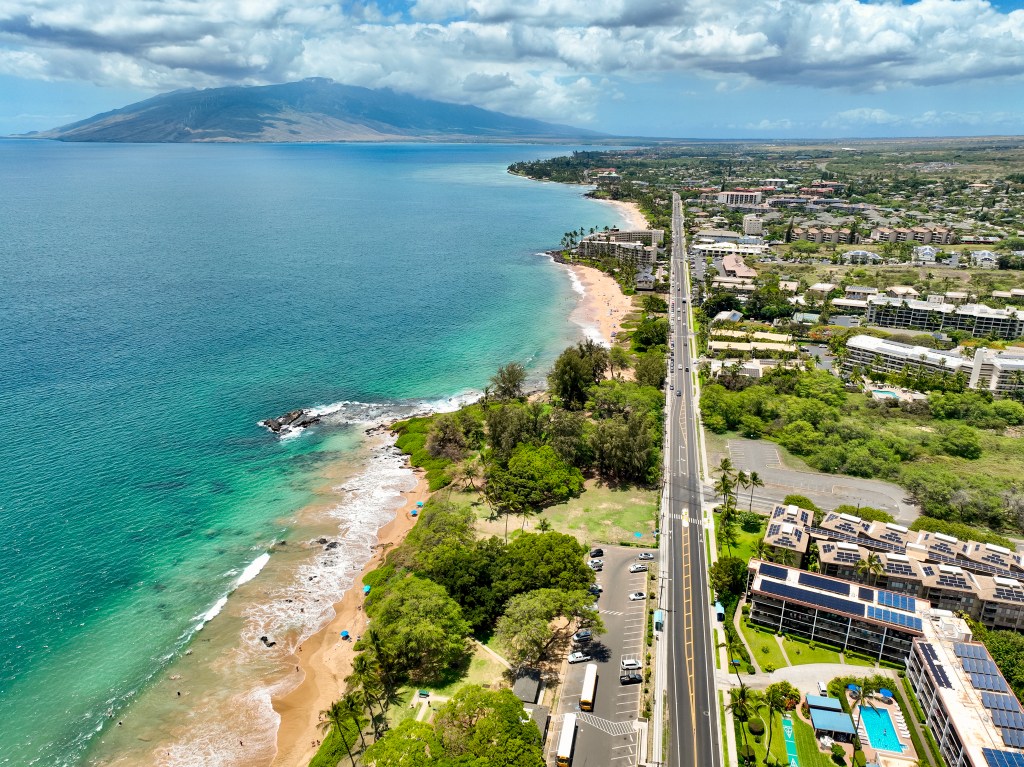 South Kihei Road stretches along South Maui by Kamaole Beach Park, May 21, 2024. (Nathan Eagle/Civil Beat/2024)