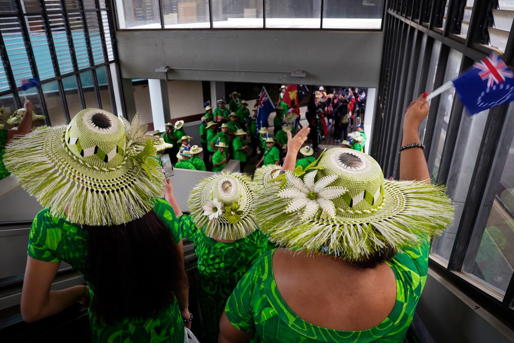 Cook Islands delegates enter the 13th Festival of Pacific Arts & Culture opening ceremony Thursday, June 6, 2024, in Honolulu. Known as FestPac for short, takes place every four years, however, missing the last event because of COVID. (Kevin Fujii/Civil Beat/2024)