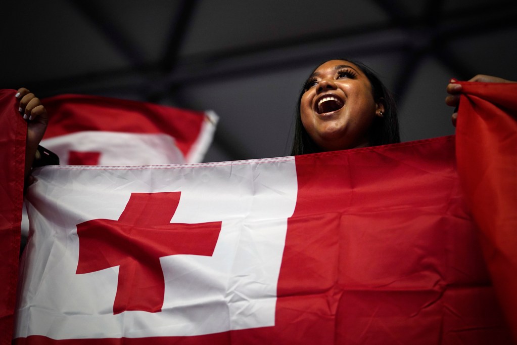 Ariitema Vulivalu Ikahihifo screams with excitement as the delegation from Tonga enters the 13th Festival of Pacific Arts & Culture opening ceremony Thursday, June 6, 2024, in Honolulu. Known as FestPac for short, takes place every four years, however, missing the last event because of COVID. (Kevin Fujii/Civil Beat/2024)