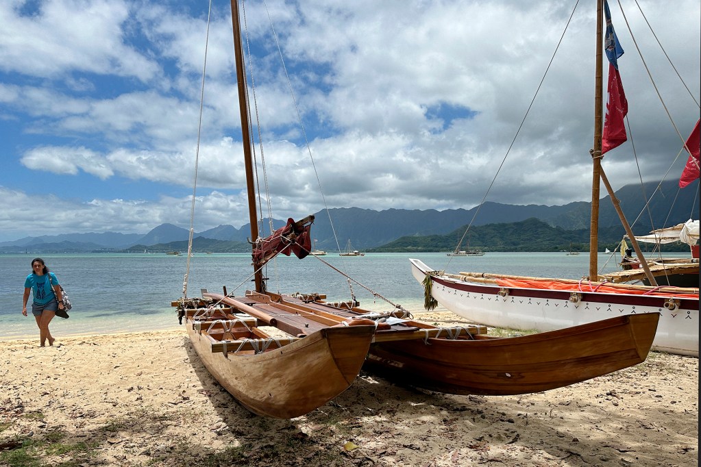 An Aotearoa canoe sits on the shore of Kualoa Regional Park Sunday, June 9, 2024, in Kaneohe. The Aotearoa delegation is part of FestPac. (Kevin Fujii/Civil Beat/2024)