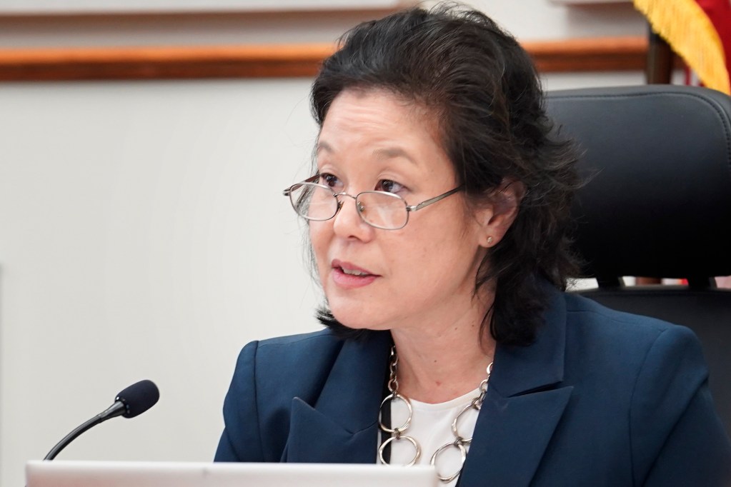 PUC commissioner Naomi Kuwaye addresses Sandwich Isles Communications president Al Hee during a hearing Monday, June 17, 2024, in Honolulu. (Kevin Fujii/Civil Beat/2024)