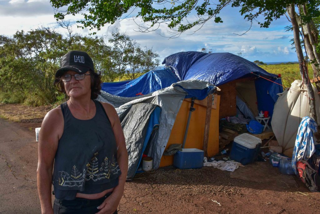 Tracy Shaffer, 60, who lives along Holomua Road in Paia has been homeless for about two years since she was in a moped accident that has left her memory fuzzy and her head with a big scar. (Cammy Clark/Civil Beat/2024)