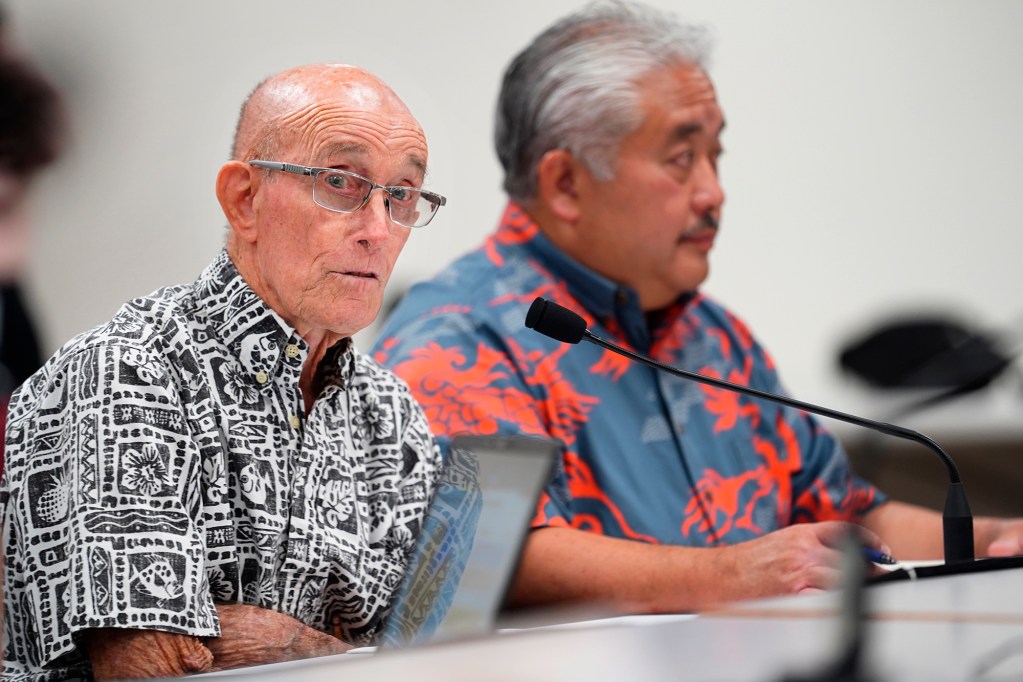 Department of Education Deputy Superintendent Randy Moore, left, and Superintendent Keith Hayashi address the Hawaii state House of Representatives Committee on Education during a special Informational Briefing on Thursday, Aug. 15, 2024, in Honolulu. The hearing outside of regular session is to learn about the bus-driver shortage and informing parents with only three days before school began. (Kevin Fujii/Civil Beat/2024)
