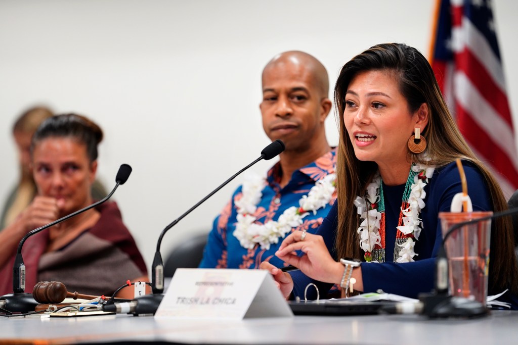 Hawaii state House of Representatives Committee on Education Vice Chair Trish La Chica, right, questions Department of Education Deputy Superintendent Randy Moore during a special Informational Briefing on Thursday, Aug. 15, 2024, in Honolulu. The hearing outside of regular session is to learn about the bus-driver shortage and informing parents with only three days before school began.  Chair Justin Woodson, center, and Rep. Amy Perruso, left, look on. (Kevin Fujii/Civil Beat/2024)