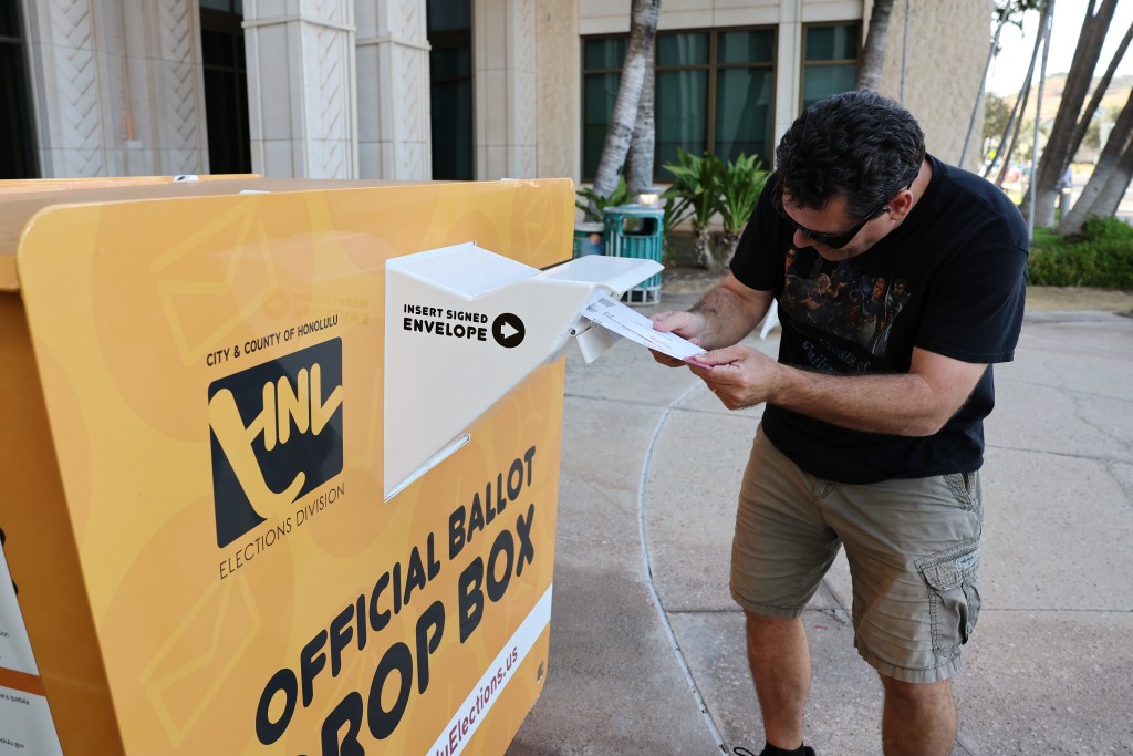Kapolei resident Johnny Hill drops off his ballot at Kapolei Hale, Saturday, August 10, 2024 in Kapolei, Hawaii. Marco Garcia/CivilBeat/2024