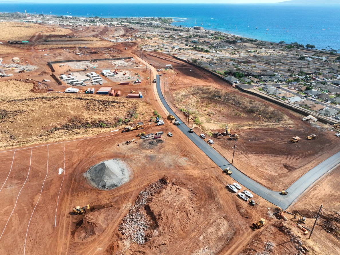 The state and federal government are constructing adjacent temporary group housing projects, seen here last week, for hundreds of displaced Lahaina residents to live. (Nathan Eagle/Civil Beat/2024)