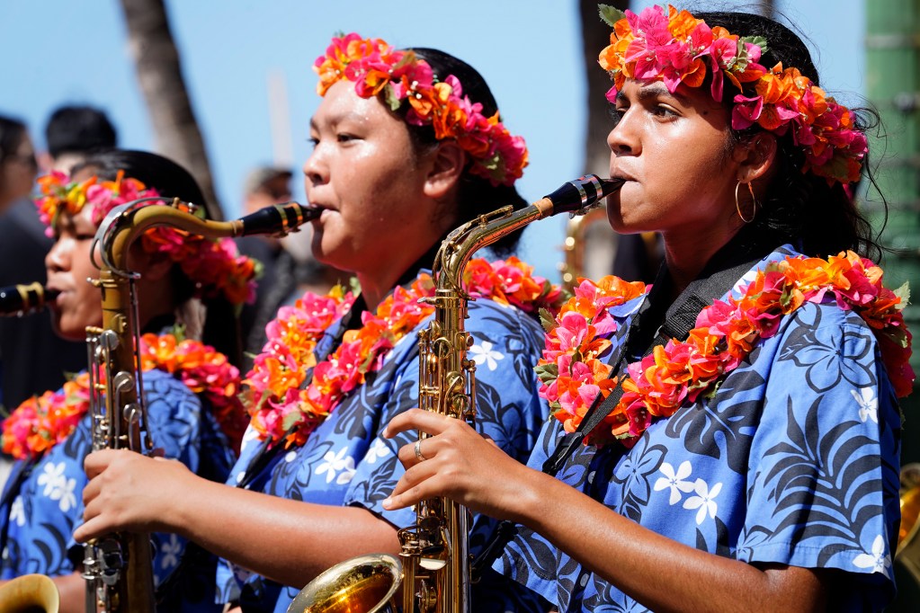 Moanalua High School’s marching band performs in the Aloha Festivals 76th Annual Floral Parade Saturday, Sept. 25, 2024, in Honolulu. (Kevin Fujii/Civil Beat/2024)