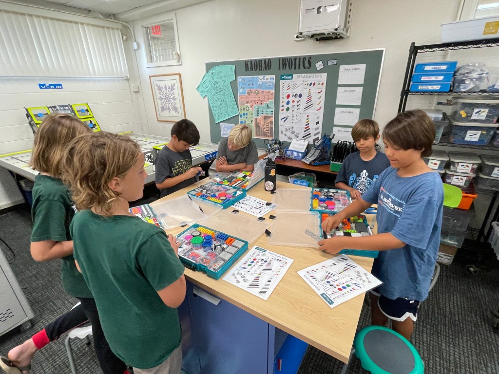 Students at Kaohao Charter participate in small group activities like robotics.