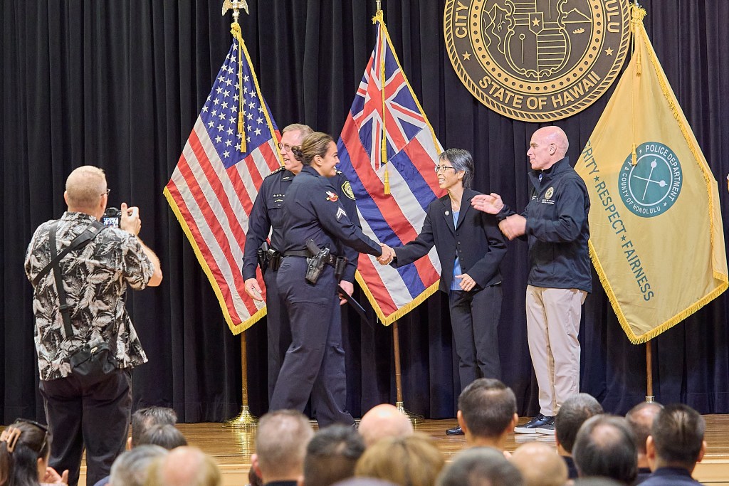 Forty-five officers and civilians were recognized during a promotion ceremony at the Mission Memorial Auditorium on November 19th.  Ashley Joy Fernandez became a Corporal and attached to Traffic Division.(David Croxford/Civil Beat/2024)