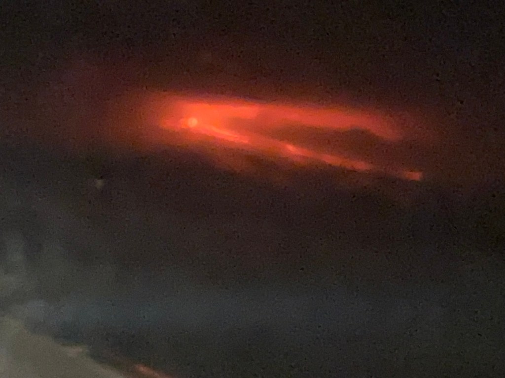 Mauna Loa's eruption captured from the port side of a Hawaiian Airlines plane on Nov. 29, 2022