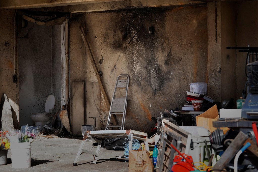 The blackened wall of a home where a deadly, New Year’s Eve fireworks explosion took place is photographed Thursday, Jan. 2, 2025, in Honolulu’s Salt Lake neighborhood. Multiple fatalities and injuries were reported. (Kevin Fujii/Civil Beat/2025)