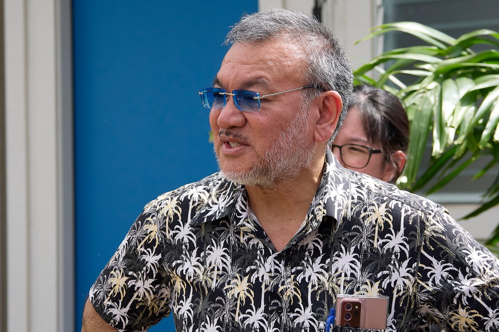 Former State Representative John Mizuno and Honolulu Councilman Tyler Dos Santos-Tam conducted a tour of one of the at  ALANA OLA PONO KAUHALE (David Croxford/Civil Beat/2025)