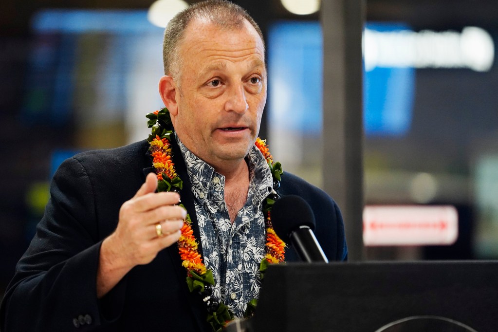 Gov. Josh Green opens the news briefing for digitizing the Hawaiʻi Department of Agriculture’s plant and animal declarations Monday, Feb. 24, 2025, at Daniel K. Inouye International Airport in Honolulu. This is designed to reduce manpower required to read and asses the paper forms travelers arriving in Hawaiʻi fill out on airplanes. (Kevin Fujii/Civil Beat/2025)