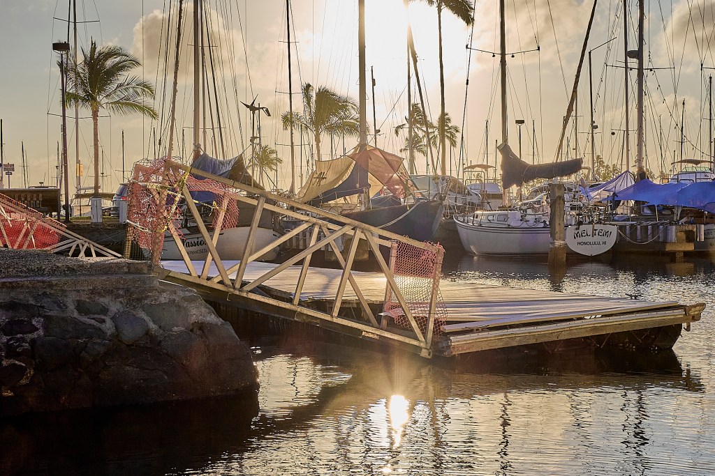 A landing pontoon/floating dock at the diamond Head end of the Ala Wai Boat harbor has been in disrepair for several months and remains unaccessible to local boaters. Photographed February 28th, 2025. (David Croxford/Civil Beat/2025)