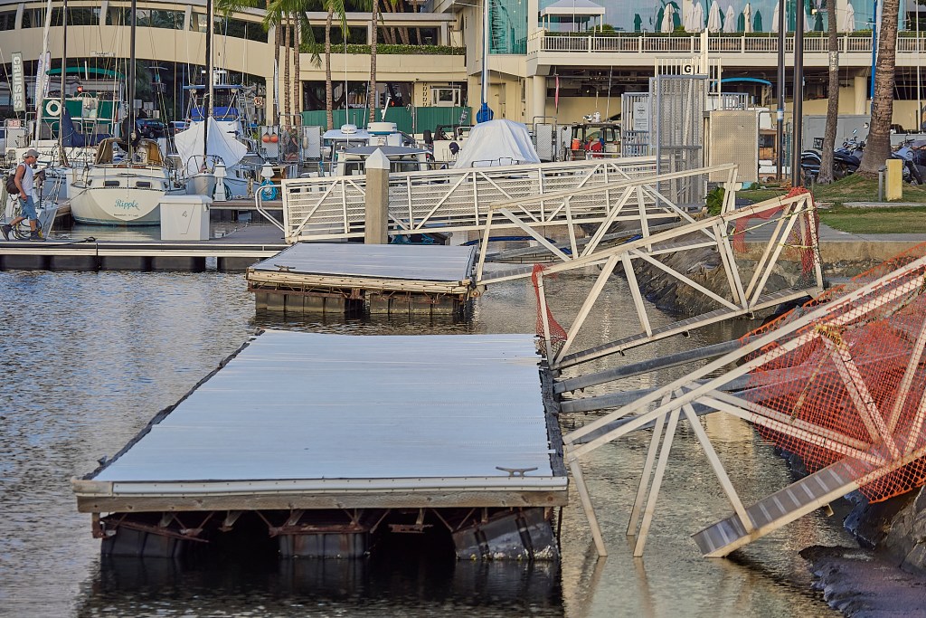 A landing pontoon/floating dock at the diamond Head end of the Ala Wai Boat harbor has been in disrepair for several months and remains unaccessible to local boaters. Photographed February 28th, 2025. (David Croxford/Civil Beat/2025)