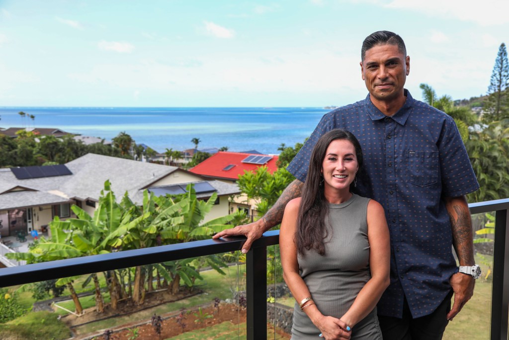 Tristyn (left) and Kamohai (right) on the new deck of the "Bee House," as seen on Renovation Aloha, Season 1.