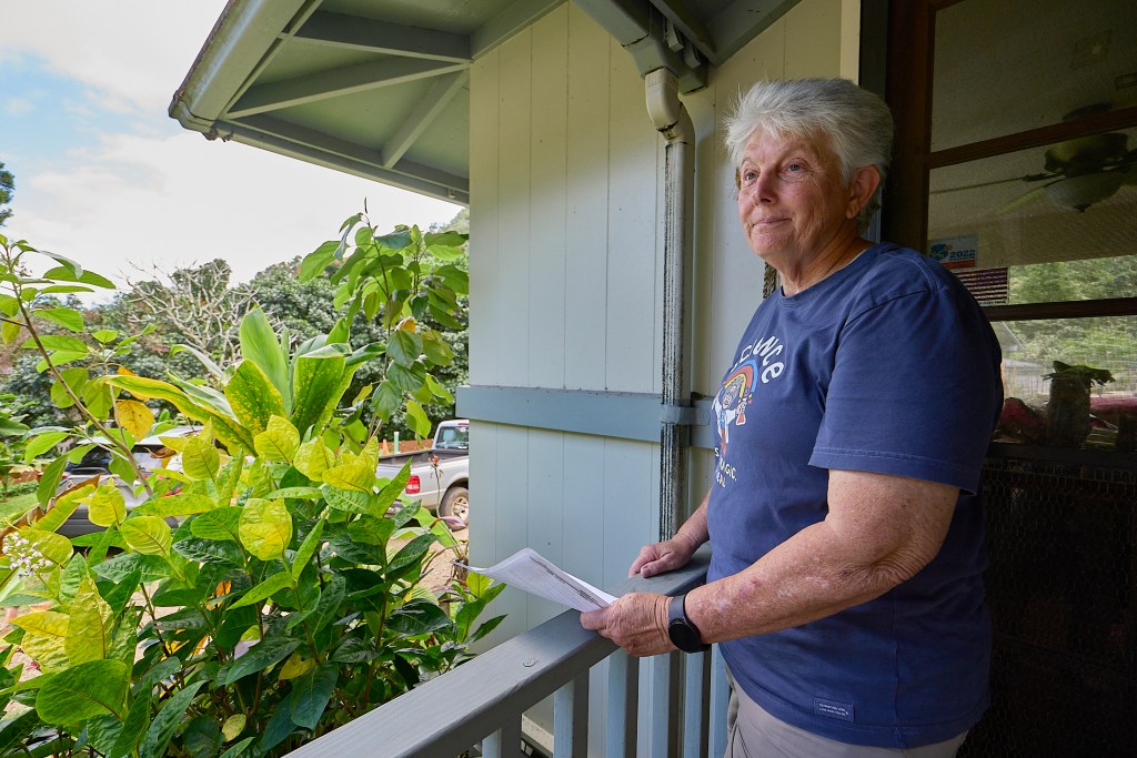 Teresa Parsons, a retired US Army Nurse and Educator came to Malumalu Place in Kaneohe to enjoy her retirement years in the quietness of the valley.  In trying to upgrade the home that had become her residence Parsons was forced to work with delays in excess of 400 days while topographical Maps could be drawn to meet the newest requirements of DPP permitting requirements..  Her land and the homes on the acreage are photographed Tuesday afternoon, April 8th, 2025. (David Croxford/Civil Beat/2025)