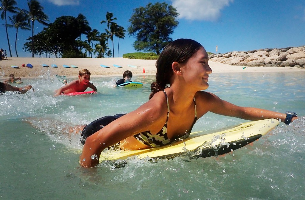 Lanakila Patterson, 12, leads the charge during a Honolulu Ocean Safety Division Junior Lifeguard Program boogie-board rescue at Ko’olina Thursday, June 26, 2025, in Kapolei. (Kevin Fujii/Civil Beat/2025)