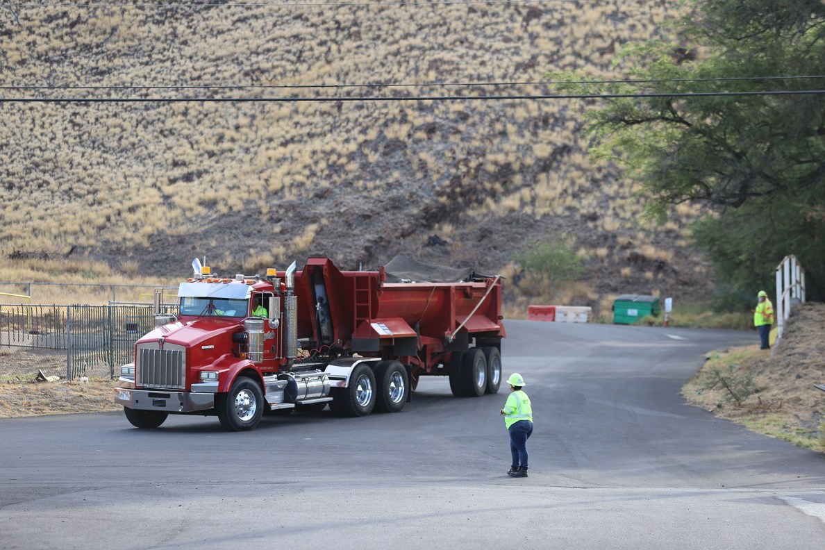 Truck pulling into the loading area for the fire debris removal