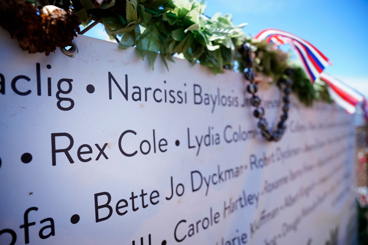Rex Cole’s name is listed Wednesday, July 23, 2025, at a memorial site in Lahaina. Cole, a homeless man, died in the Aug. 8, 2023. (Kevin Fujii/Civil Beat/2025)