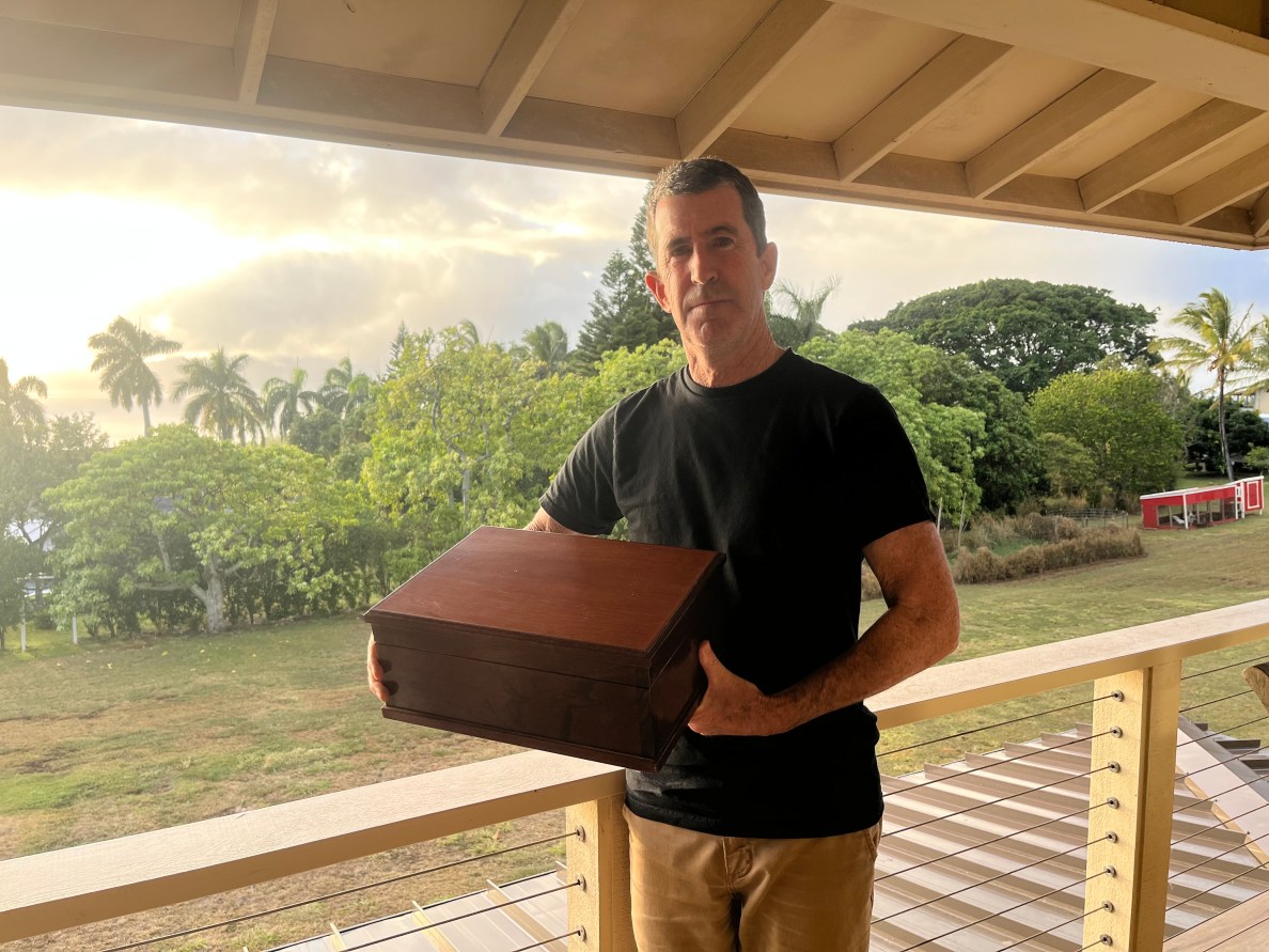 Paul Brown with Rex Cole's ashes