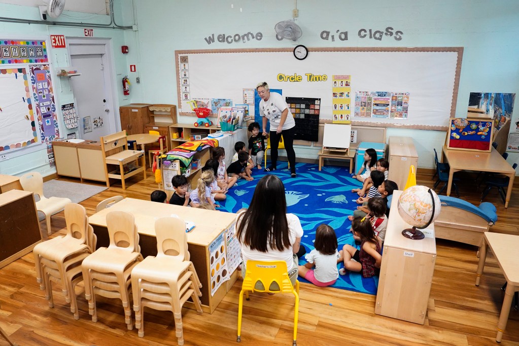 Waikīkī Community Center Preschool Ai‘a class teacher Ryna Ota shares Circle Time to recognize each student in attendance photographed Thursday, Sept. 11, 2025, in Honolulu. (Kevin Fujii/Civil Beat/2025)