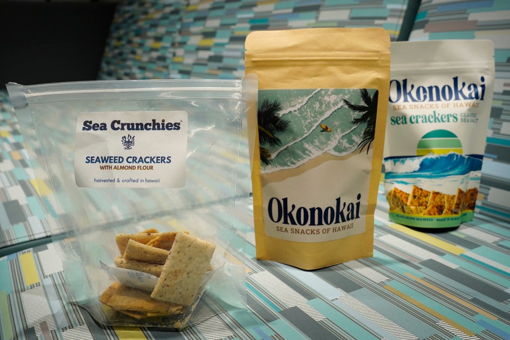 The three generations of Jina Wye’s Okonokai limu crackers are on display at the Wahiawā Value-Added Product Development Center Wednesday, Sept. 17, 2025, in Wahiawā. The center makes producing her “Made in Hawaiʻi” crackers easier with facilities and amenities usually owned by mass-production companies. (Kevin Fujii/Civil Beat/2025)