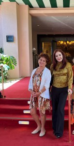 Debbie Cravatta of the Big Island animal rescue group KARES poses with Priscilla Presley outside the Beverly Hills Hotel.