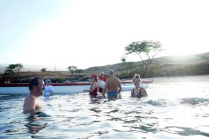 Kawaihae Canoe Club paddlers take a mid-workout break at Mau'umae Beach Friday, Oct. 3, 2025, in Waimea. (Kevin Fujii/Civil Beat/2025)
