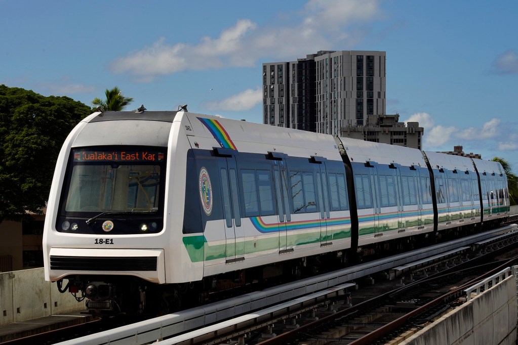 A Skyline commuter enters the Hālawa Aloha Stadium station Thursday, Oct. 9, 2025, in Honolulu. (Kevin Fujii/Civil Beat/2025)