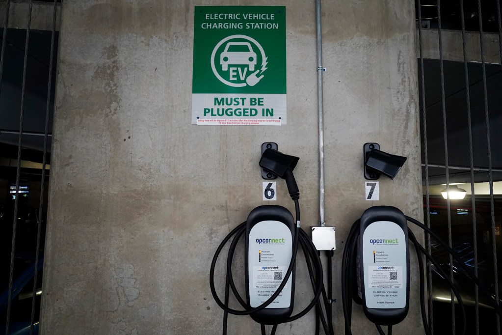 Electric vehicle chargers at the Daniel K. Inouye International Airport are photographed Friday, Nov. 7, 2025, in Honolulu. (Kevin Fujii/Civil Beat/2025)