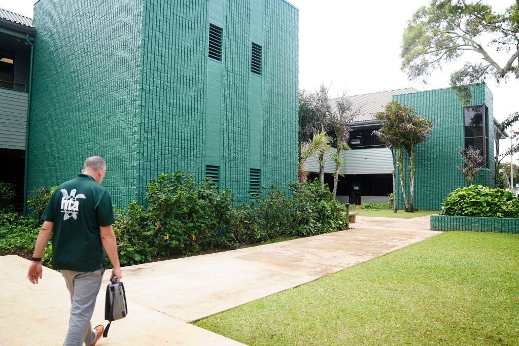 Hawaiʻi Technology Academy Kauaʻi Campus Director Nathaniel Evslin walks to a classroom Wednesday, Nov. 19, 2025, in a Līhuʻe office park. (Kevin Fujii/Civil Beat/2025)