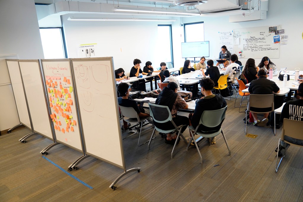 DreamHouse charter high school uses partitions as white boards and message boards to separate classes Tuesday, Dec. 9, 2025, in Kapolei. (Kevin Fujii/Civil Beat/2025)