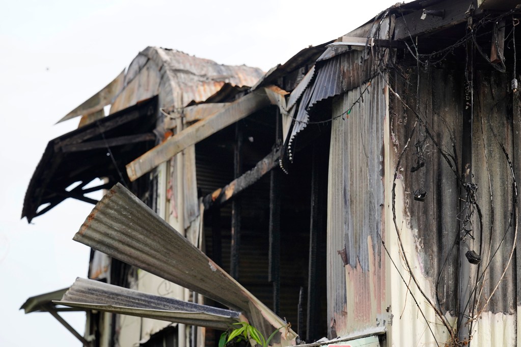 The aftermath of the former poi factor fire is photographed Tuesday, Dec. 16, 2025, in Hilo. Two women died at the former poi factory. (Kevin Fujii/Civil Beat/2025)