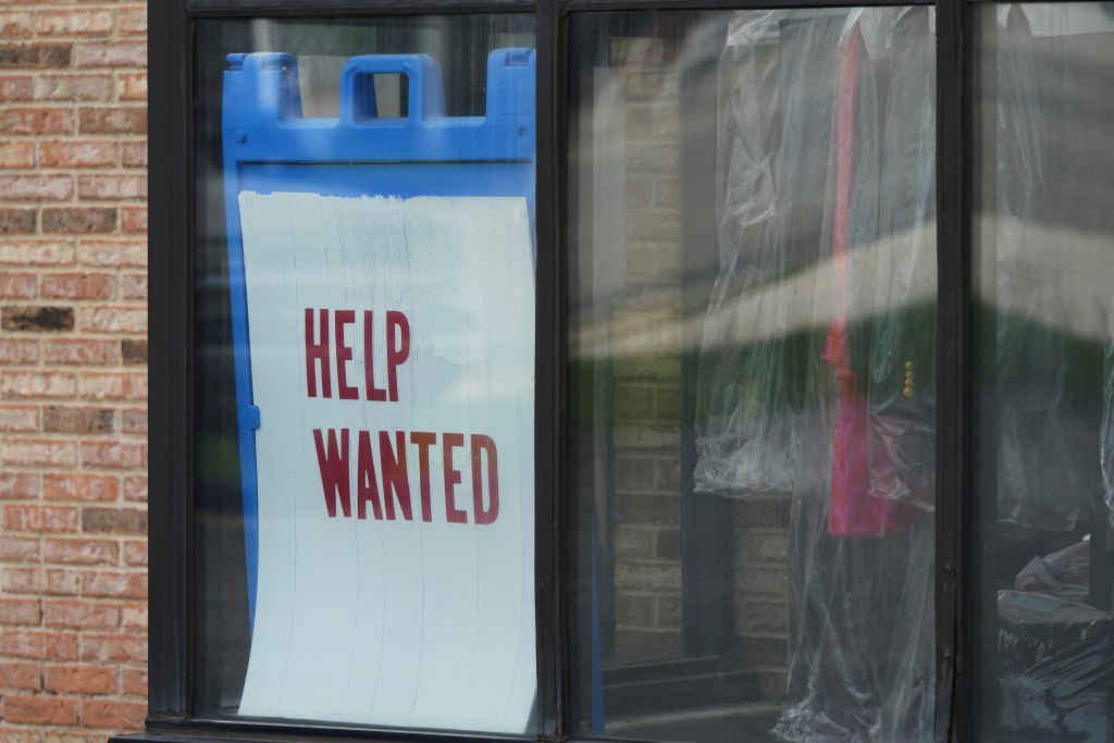 "Help Wanted" sign is displayed at a dry cleaner in Rolling Meadows, Ill., Thursday, May 15, 2025. (AP Photo/Nam Y. Huh)