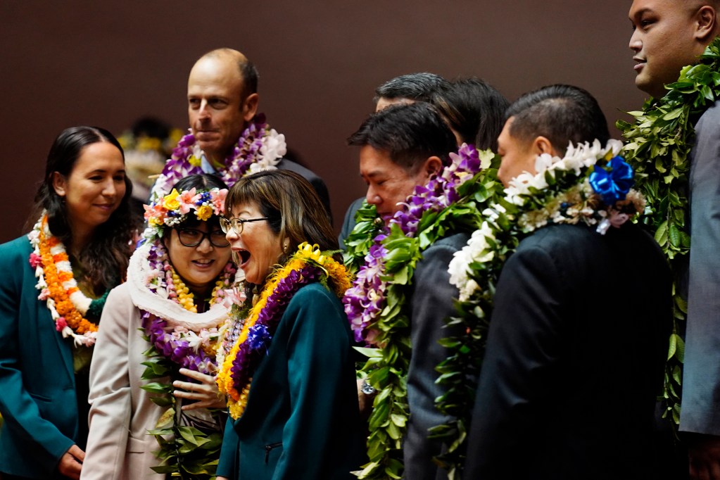 Speaker of the House Nadine Nakamura gets a laugh out of a group photo after the Hawaiʻi State Legislature opening day Wednesday, Jan. 21, 2026, in Honolulu. (Kevin Fujii/Civil Beat/2026)