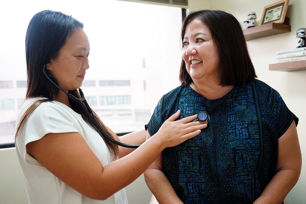 Dr. Donna Mayeda meets with patient Regina Yoshimori Monday, Feb. 2, 2026, in Honolulu.  (Kevin Fujii/Civil Beat/2026)
