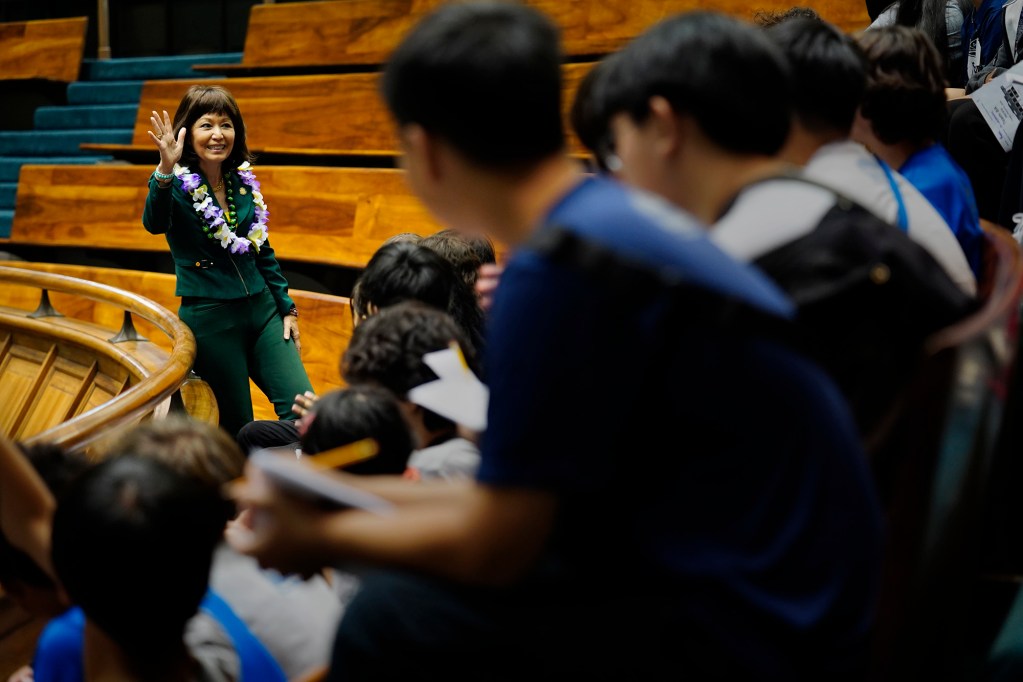 Sen. Donna Kim meets with Moanalua Middle School students in the Senate gallery Friday, March 6, 2026, in Honolulu. (Kevin Fujii/Civil Beat/2026)
