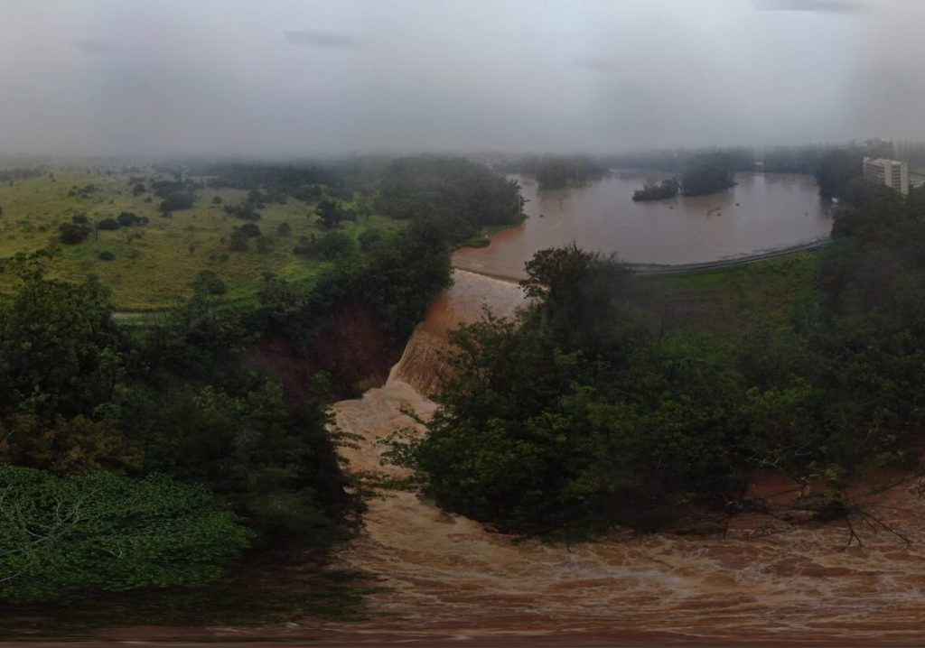 Wahiawā Dam rose to dangerously high levels on Friday even as water flowed over the spillway at the rate of 1,500 gallons a second.