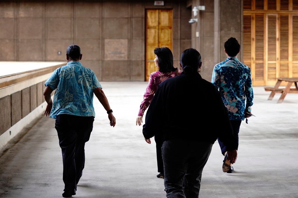 Lt. Gov. Sylvia Luke leaves the governor’s office with aides and security Thursday, April 23, 2026, in Honolulu. (Kevin Fujii/Civil Beat/2026)
