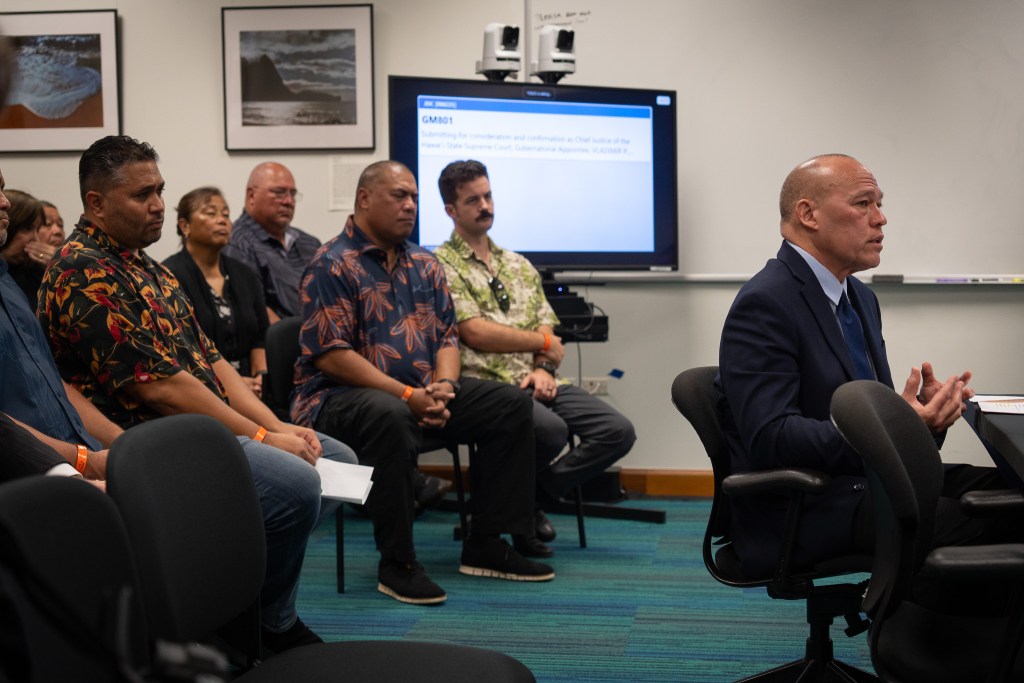 Hawai'i Supreme Court Chief Justice nominee Vladimir Devens speaks during his confirmation hearing with several supporters behind him during a Senate Judiciary Committee meeting at the Capitol April 22, 2026. The committee holds its vote on April 24. (Craig Fujii/Civil Beat/2026)