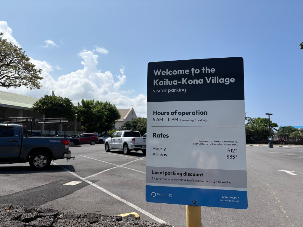 Paid parking lots are taking over in Kailua-Kona Village. (For lease signs are scattered across empty storefronts in Kona Inn Shopping Center.