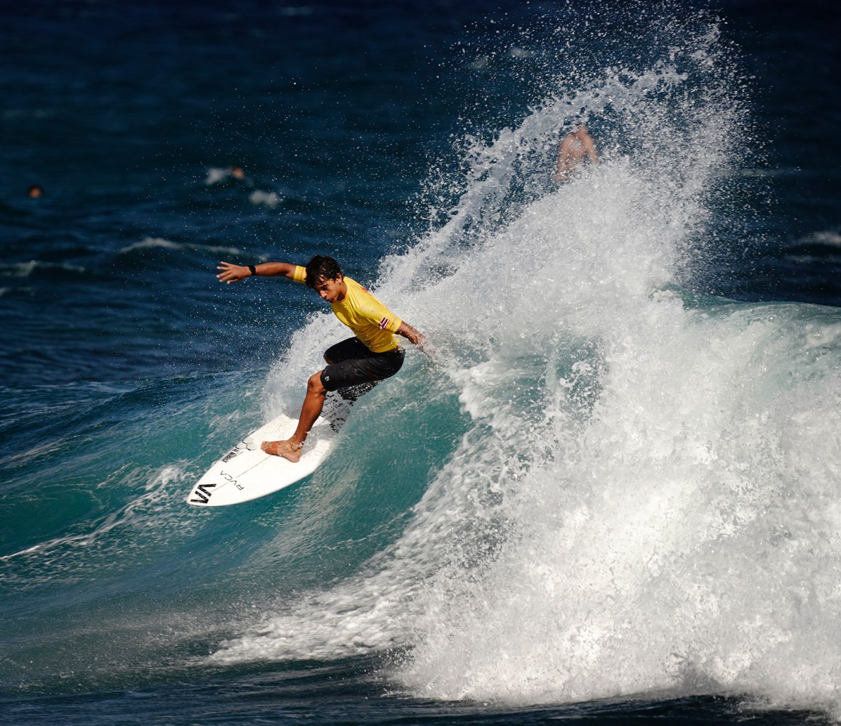Kahlil Pineres-Schooley of Seabury Hall competes in the boys shortboard semifinals of the inaugural Hawaiʻi High School Athletics Association surfing championships Saturday, May 2, 2026, at Hoʻokipa Beach Park in Pāʻia. Pineres-Schooley was later crowned the boys shortboard champion. (Kevin Fujii/Civil Beat/2026)