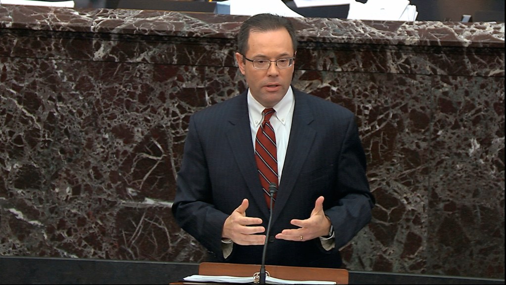 In this image from video, White House deputy counsel Mike Purpura speaks during the impeachment trial against President Donald Trump in the Senate at the U.S. Capitol in Washington, Monday, Jan. 27, 2020. (Senate Television via AP)